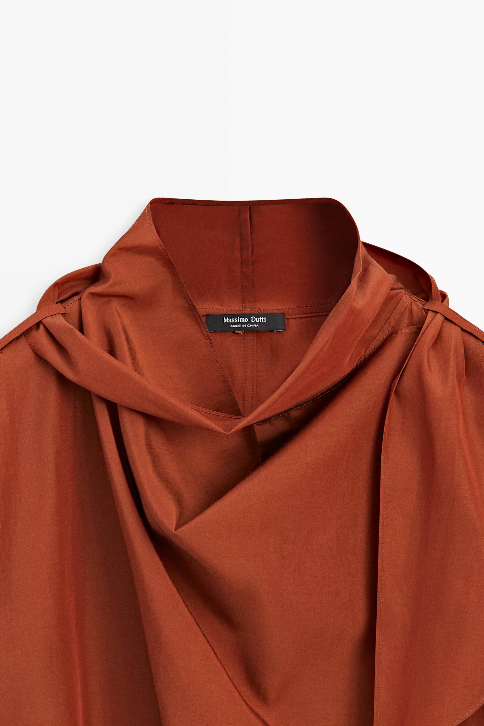 Flowing blouse with tie detail